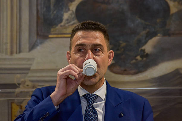 Roberto Vannacci drinks coffee before the press conference on his new party 'Futuro Nazionale' at the Foreign Press Association, Palazzo Grazioli.