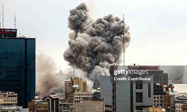 General view of Tehran with smoke visible in the distance after explosions were reported in the city, on March 02, 2026 in Tehran, Iran.