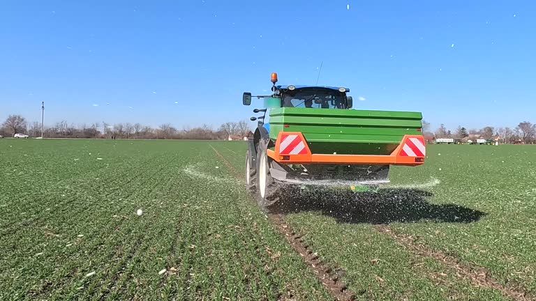 https://media.gettyimages.com/id/2264564786/video/tractor-and-spreader-fertilizer-working-on-wheat-field-slow-motion.jpg?b=1&s=640x640&k=20&c=bO3ZnqLfThivbX9ba9238nbDauAye3gSIPNUtGljY_A=