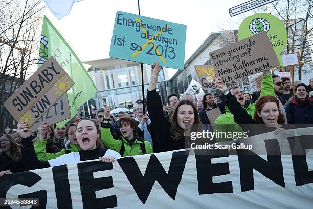 Climate activists, including Luisa Neubauer of Fridays for Future, protest in front of the Chancellery against rollbacks in energy transition...