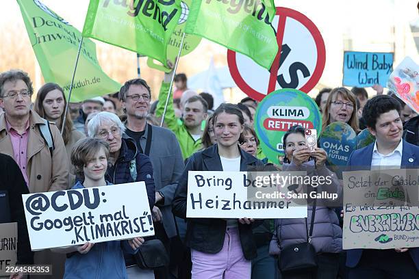 Activists from Fridays for Future and other groups protest in front of the Chancellery against rollbacks in energy transition policies by the...