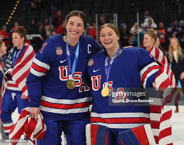 Hilary Knight and Aerin Frankel of Team United States celebrate following the Women's Gold Medal match between the United States and Canada on day 13...