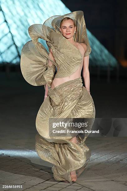 Diane Kruger attends the Grand Dîner du Louvre at Musee du Louvre on March 03, 2026 in Paris, France. The purpose of this annual evening is to raise...