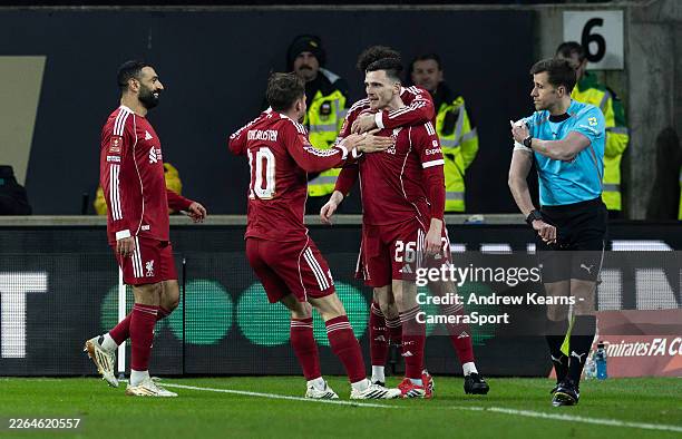 Liverpool's Andrew Robertson celebrates scoring his side's first goal with team mates during the Emirates FA Cup Fifth Round match between...