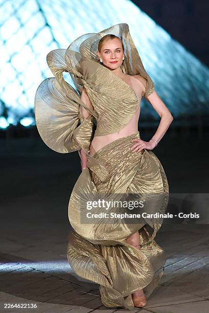 Diane Kruger attends the Grand Dîner du Louvre at Musee du Louvre on March 03, 2026 in Paris, France. The purpose of this annual evening is to raise...