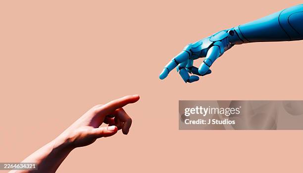 human and robotic fingers reaching toward a connection - braço humano imagens e fotografias de stock