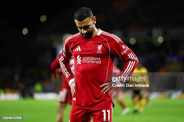 Mohamed Salah of Liverpool looks dejected following the Premier League match between Wolverhampton Wanderers and Liverpool at Molineux on March 03,...