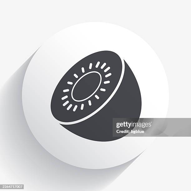 kiwi. icon on circle button with long shadow - kiwi slice white background stock illustrations