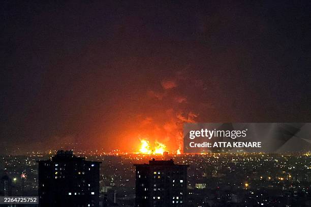 Explosions erupt following strikes at Tehran Oil Refinery in Tehran on March 7, 2026. The United States and Israel launched strikes against Iran on...
