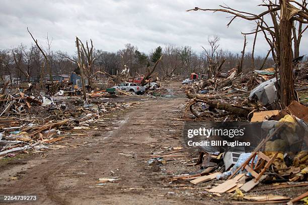 Damage and debris are seen along Tuttle Road following a tornado that hit several cities in rural southwest Michigan on March 7, 2026 in Union City,...
