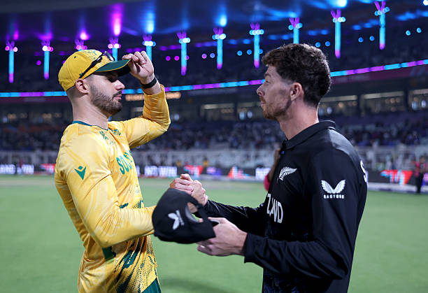 Mitchell Santner of New Zealand and Aiden Markram of South Africa shake hands after the ICC Men's T20 World Cup India & Sri Lanka 2026 Semi-Final...