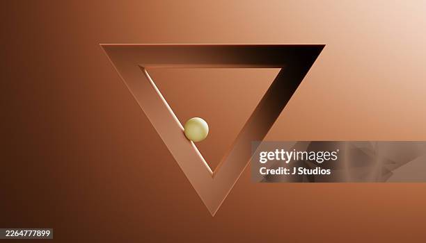 abstract triangle frame and sphere representing trapped potential - impossible triangle stock pictures, royalty-free photos & images