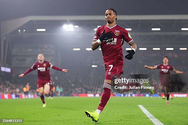 Crysencio Summerville of West Ham United celebrates scoring his team's first goal during the Premier League match between Fulham and West Ham United...