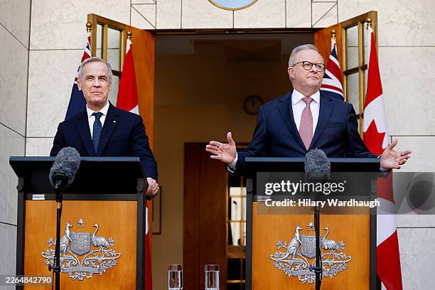 Canadian Prime Minister Mark Carney and Australian Prime Minister Anthony Albanese hold a press conference at Australian Parliament House on March...