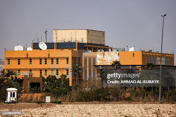 The US embassy headquarters in Iraq is pictured in Baghdad's fortified "Green Zone" on March 8, 2026. Air defence systems intercepted rockets fired...