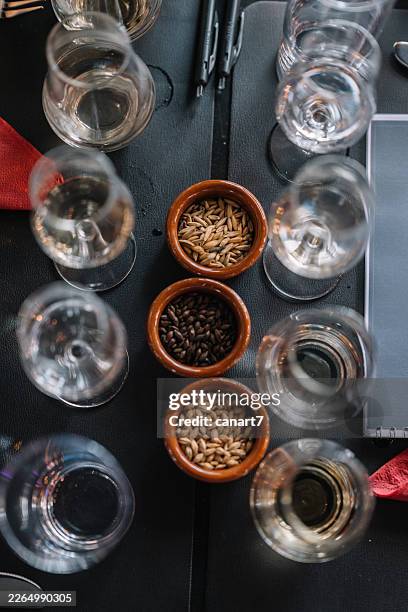 whisky tasting flight showing various grain ingredients - whiskey tasting stock pictures, royalty-free photos & images