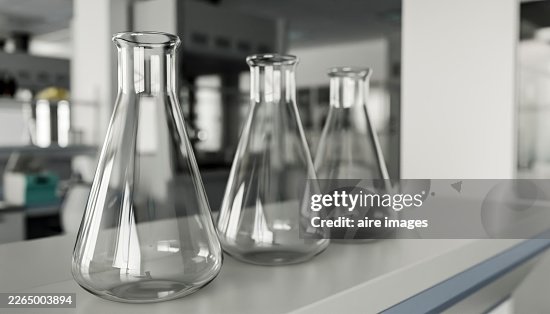 Three empty Erlenmeyer flasks in laboratory Three empty Erlenmeyer flasks in laboratory