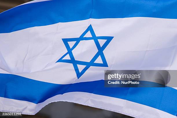 Israeli flag are seen during demonstration in support of Iranian people at the Main Square in Krakow, Poland on March 8th, 2026. Members of the...