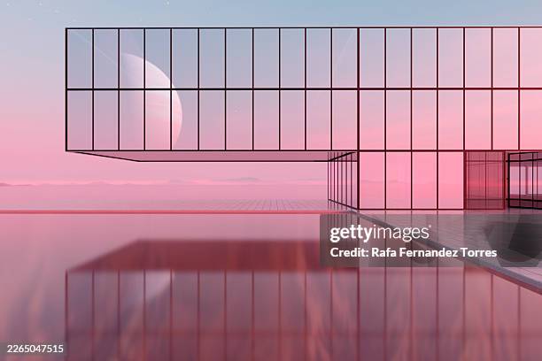 futuristic glass building with moon over reflective water - perspective photos et images de collection