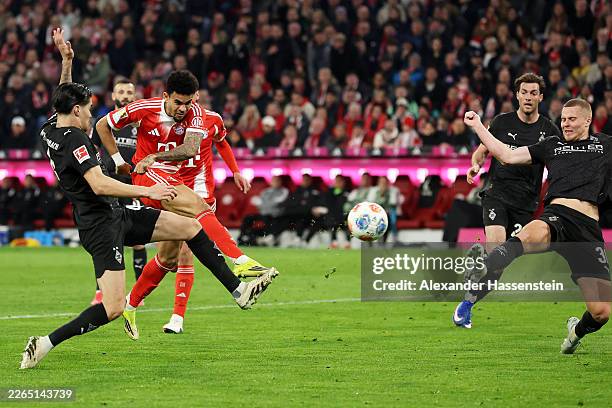 Luis Diaz of FC Bayern Munich scores his team's first goal during the Bundesliga match between FC Bayern München and Borussia Mönchengladbach at...