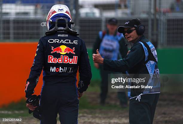 Max Verstappen of the Netherlands and Oracle Red Bull Racing walks away after a crash during qualifying ahead of the F1 Grand Prix of Australia at...