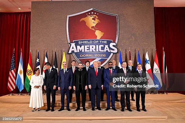 President Donald Trump stands with Kamla Persad-Bissessar, SC, MP, Prime Minister of the Republic of Trinidad and Tobago, Santiago Peña, President of...