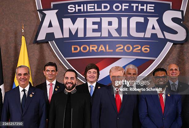 President Donald Trump stands with Luis Abinader, President of the Dominican Republic, Rodrigo Paz Pereira, President of Bolivia, Nayib Bukele,...