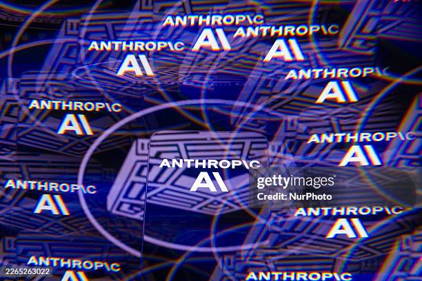 The Anthropic logo appears on a smartphone screen in this photo illustration, as the AI firm files lawsuits against the United States Department of...