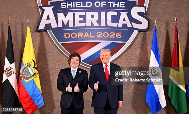 President Donald Trump greets Javier Milei, President of Argentina, as he hosts the “The Shield of the Americas Summit ,“ a gathering with heads of...