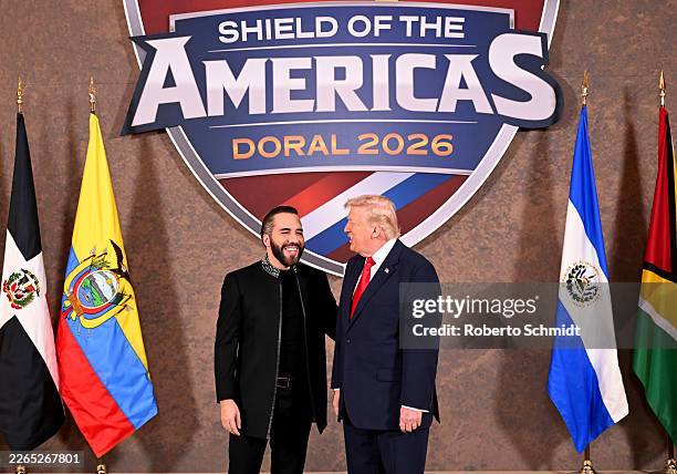 President Donald Trump greets Nayib Bukele, President of El Salvador, as he hosts “The Shield of the Americas Summit ,“ a gathering with heads of...