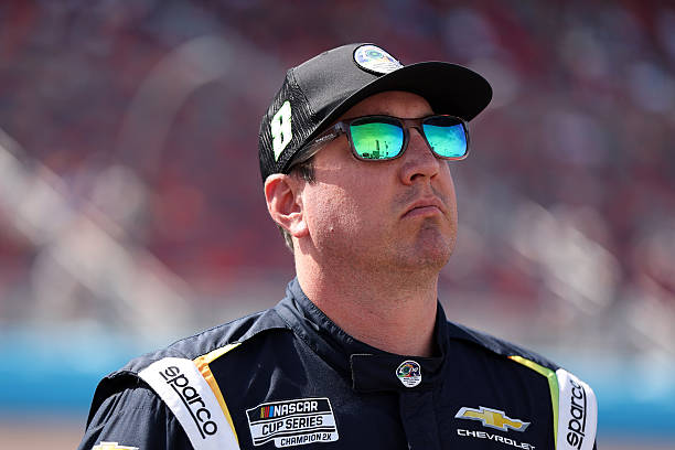 Kyle Busch, driver of the zone Jalapeno Lime Chevrolet, looks on during qualifying for the NASCAR Cup Series Straight Talk Wireless 500 at Phoenix...