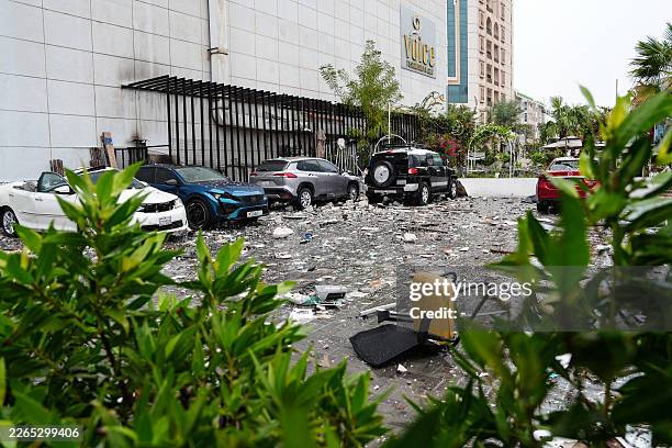 Photograph shows the damage in the aftermath of a drone strike in the Seef district of Manama on March 10, 2026. The oil-rich Gulf has borne the...