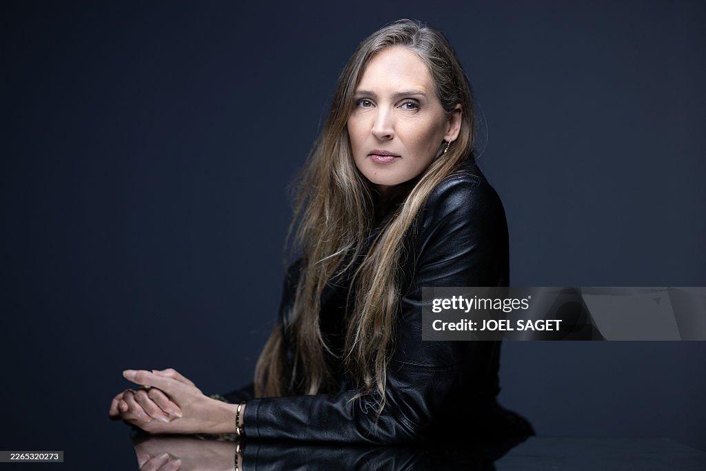 Juliette Roussel Model Former French model Juliette G. poses during a photo session in Paris ...