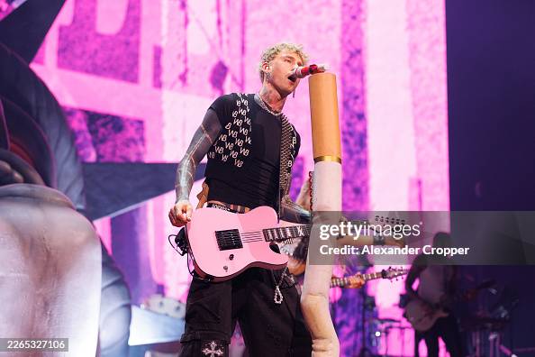 Mgk Spring Program mgk performs onstage during a concert at Co-op Live on March 07, 2026 ...