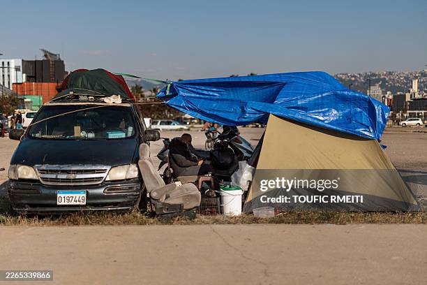 Displaced families set up tents along Beirut's waterfront in Beirut, Lebanon, on March 10 after fleeing recent IsraelHezbollah hostilities and...