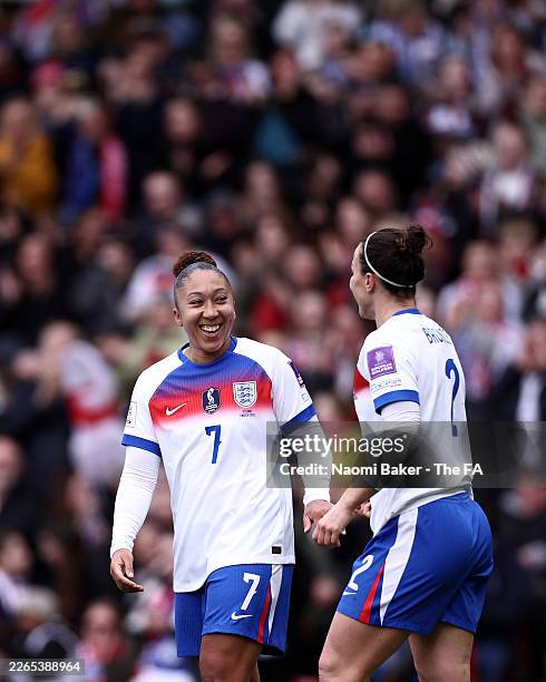 Lucy Bronze of England celebrates with Lauren James of England after scoring her teams first goal during the 2027 FIFA Women's World Cup Qualifier...