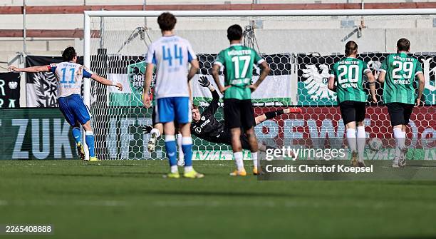 Fabian Reese of Hertha BSC Berlin scores the first goal by penalty during the 2. Bundesliga match between SC Preußen Münster and Hertha BSC at...