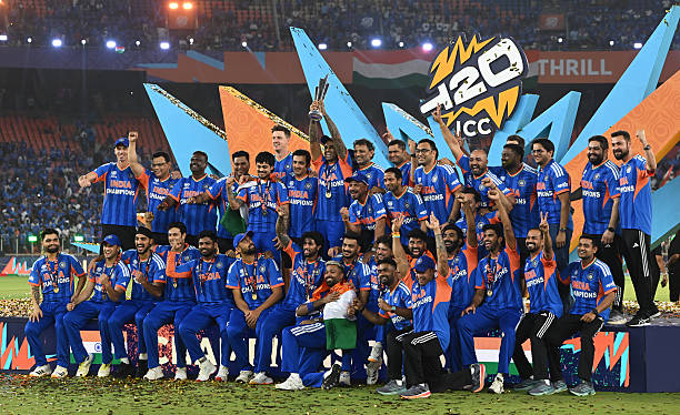 Players and coaches of India pose for a photo with the trophy after victory in the ICC Men's T20 World Cup India & Sri Lanka 2026 Final between India...