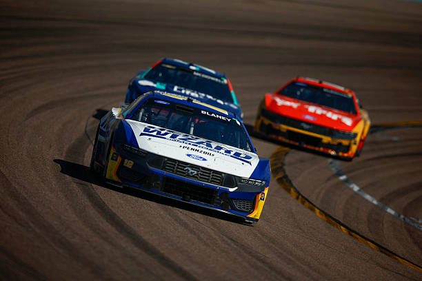 Ryan Blaney, driver of the Dent Wizard Ford, drives during the NASCAR Cup Series Straight Talk Wireless 500 at Phoenix Raceway on March 08, 2026 in...