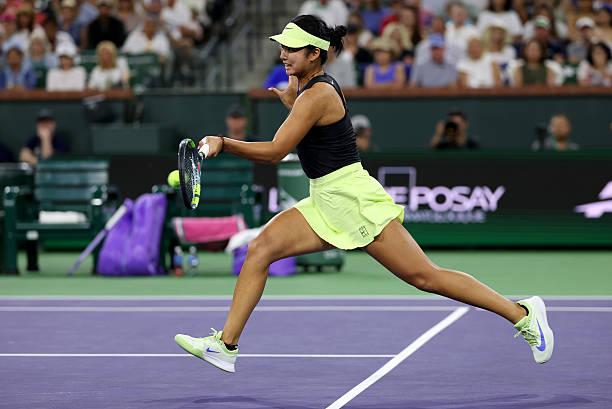 Alexandra Eala of the Phiippines plays a forehand against Coco Gauff of the United States in their third round match of the BNP Paribas Open at...