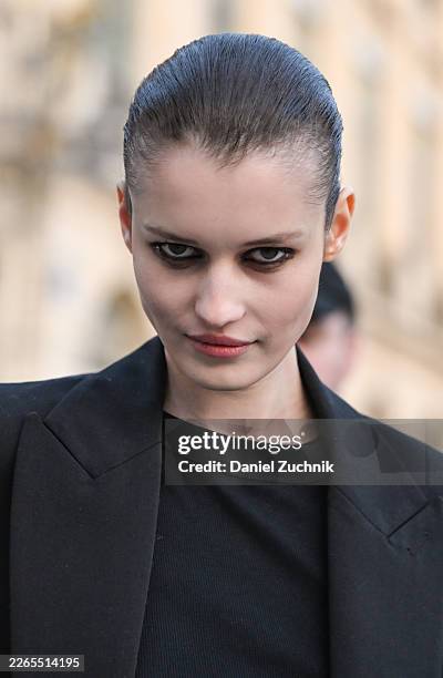 Model Lesia Havrylets is seen wearing a black blazer, black top outside the Magda Butrym show during Day Seven of Paris Fashion Week - Womenswear...
