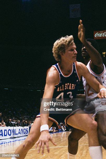 Jack Sikma being blocked by Buck Williams during an NBA All-Star game at Brendan Byrne Arena in East Rutherford, New Jersey, January 31st 1982. The...