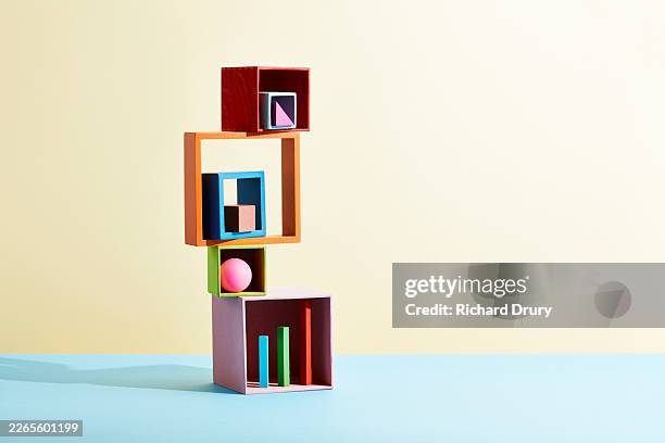 stack of geometric objects - stacking boxes stock pictures, royalty-free photos & images