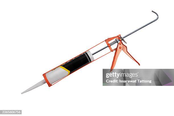 sealant gun isolated from background - caulk gun stock pictures, royalty-free photos & images