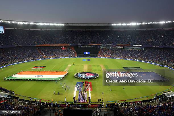 The teams take to the field during the ICC Men's T20 World Cup India & Sri Lanka 2026 Final between India and New Zealand at Narendra Modi Stadium on...
