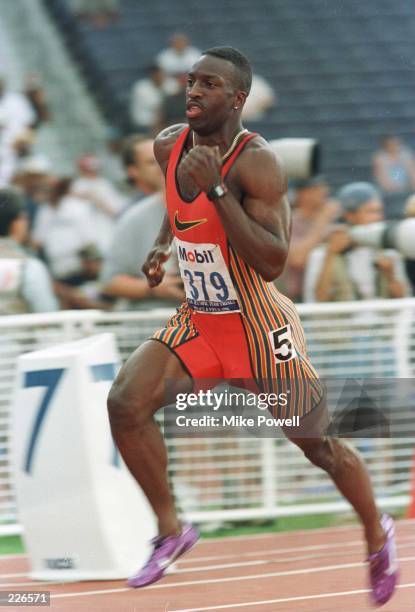 Michael Johnson focuses on the finish line as he runs the final turn in the men''s 400m final during the US Track & Field Trials at the Olympic...