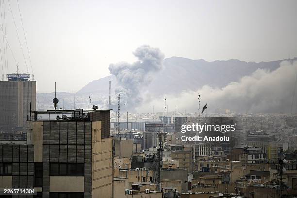 Smoke rises after airstrikes in Tehran, Iran on March 13, 2026. Successive explosions were heard across the Iranian capital Tehran on Friday, amid...