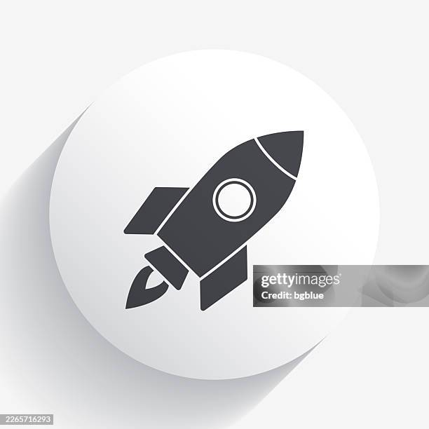 rocket. icon on circle button with long shadow - missile launch stock illustrations