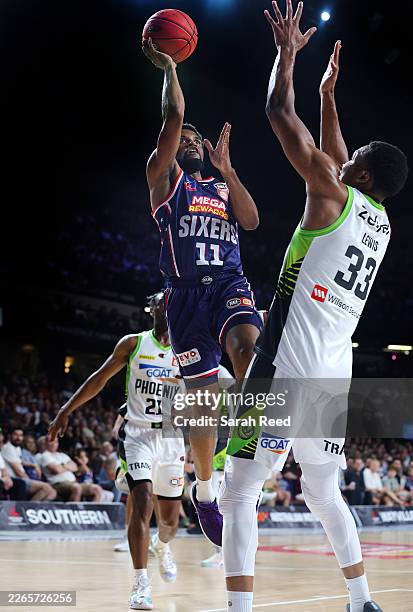Bryce Cotton of the 36ers and Malique Lewis of the Phoenix during game one of the NBL Playoff series match between Adelaide 36ers and South East...
