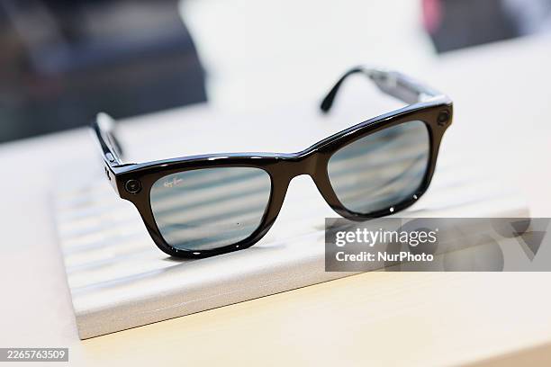 Close-up of the Ray-Ban Meta Wayfarer smart glasses in Shiny Black is displayed at the Meta booth in Hall 4, showcasing the fusion of iconic eyewear...